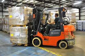 Forklift operating in a warehouse